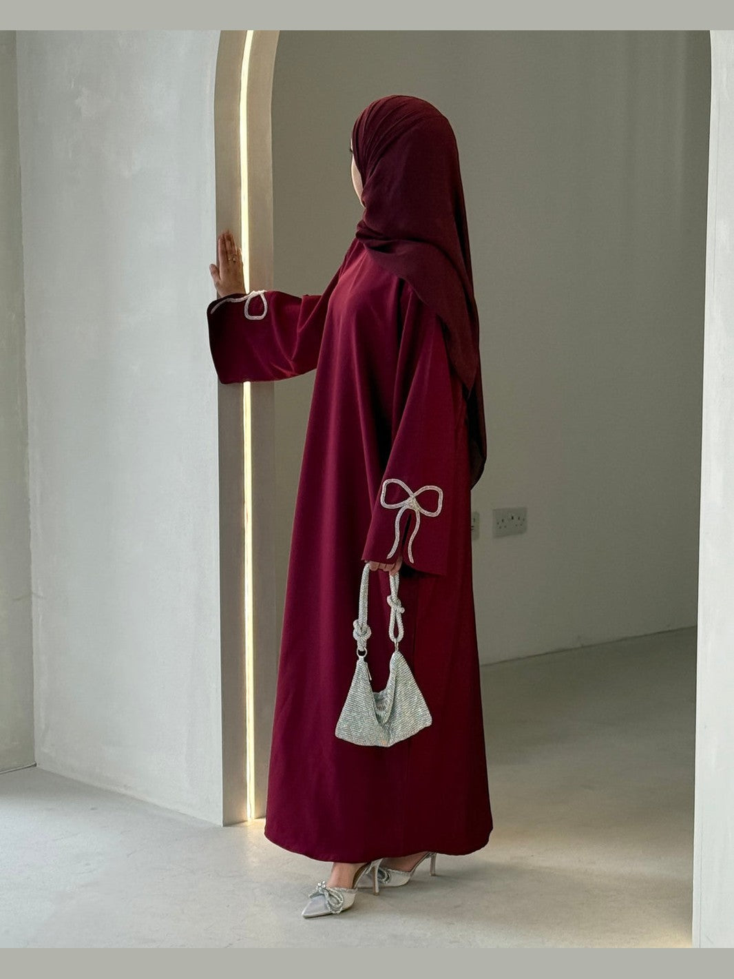 Grace In Cherry-Fawn Closed Abaya With Handcrafted Silver Bow Sleeves