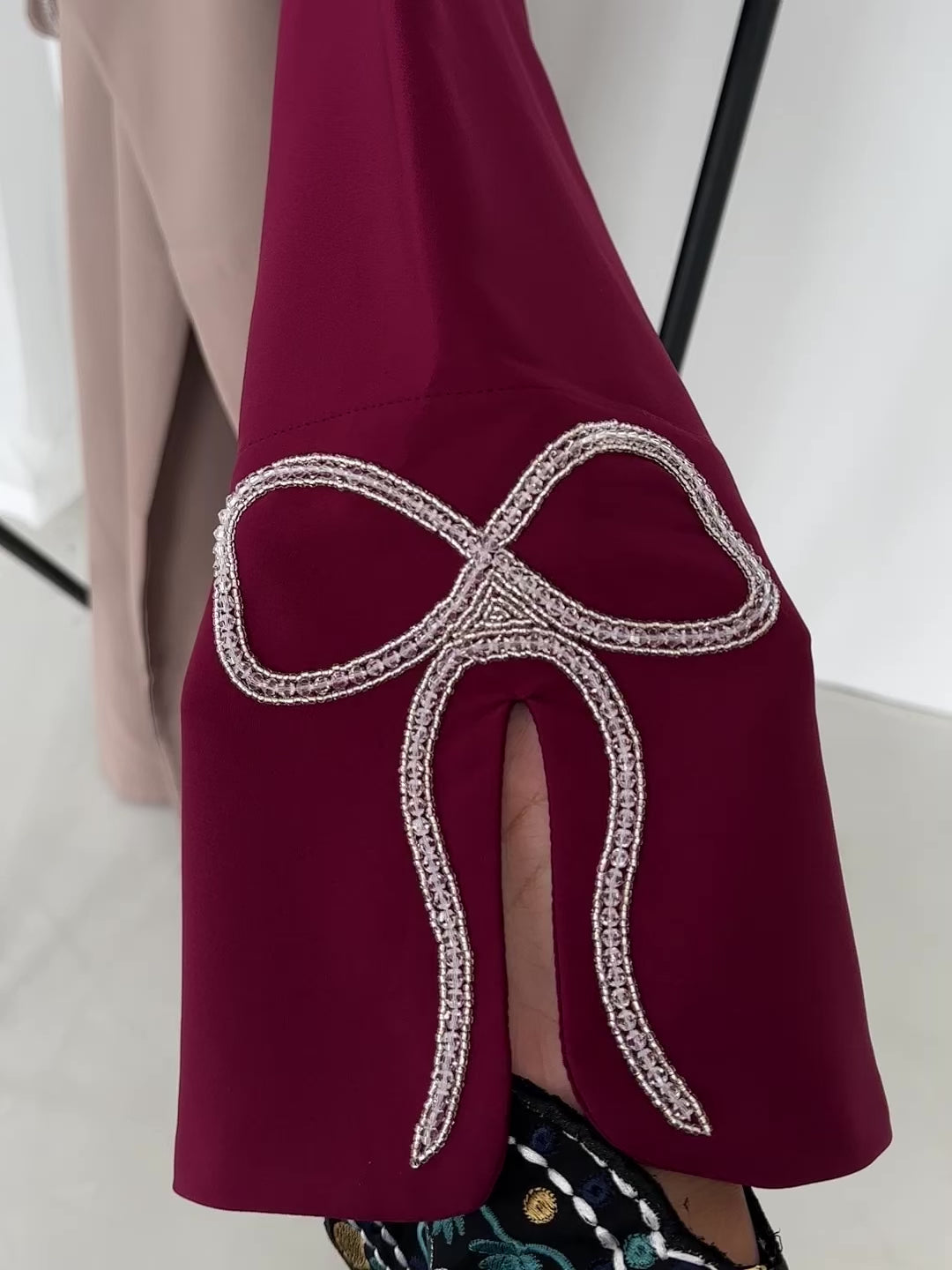 Grace In Cherry-Fawn Closed Abaya With Handcrafted Silver Bow Sleeves