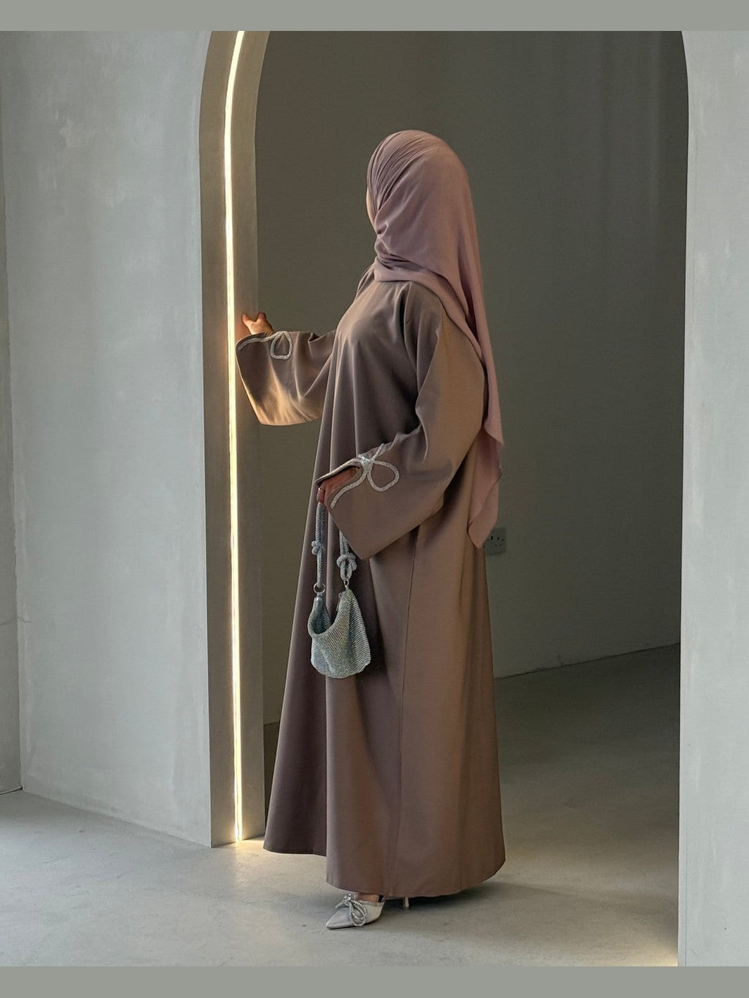 Grace In Cherry-Fawn Closed Abaya With Handcrafted Silver Bow Sleeves