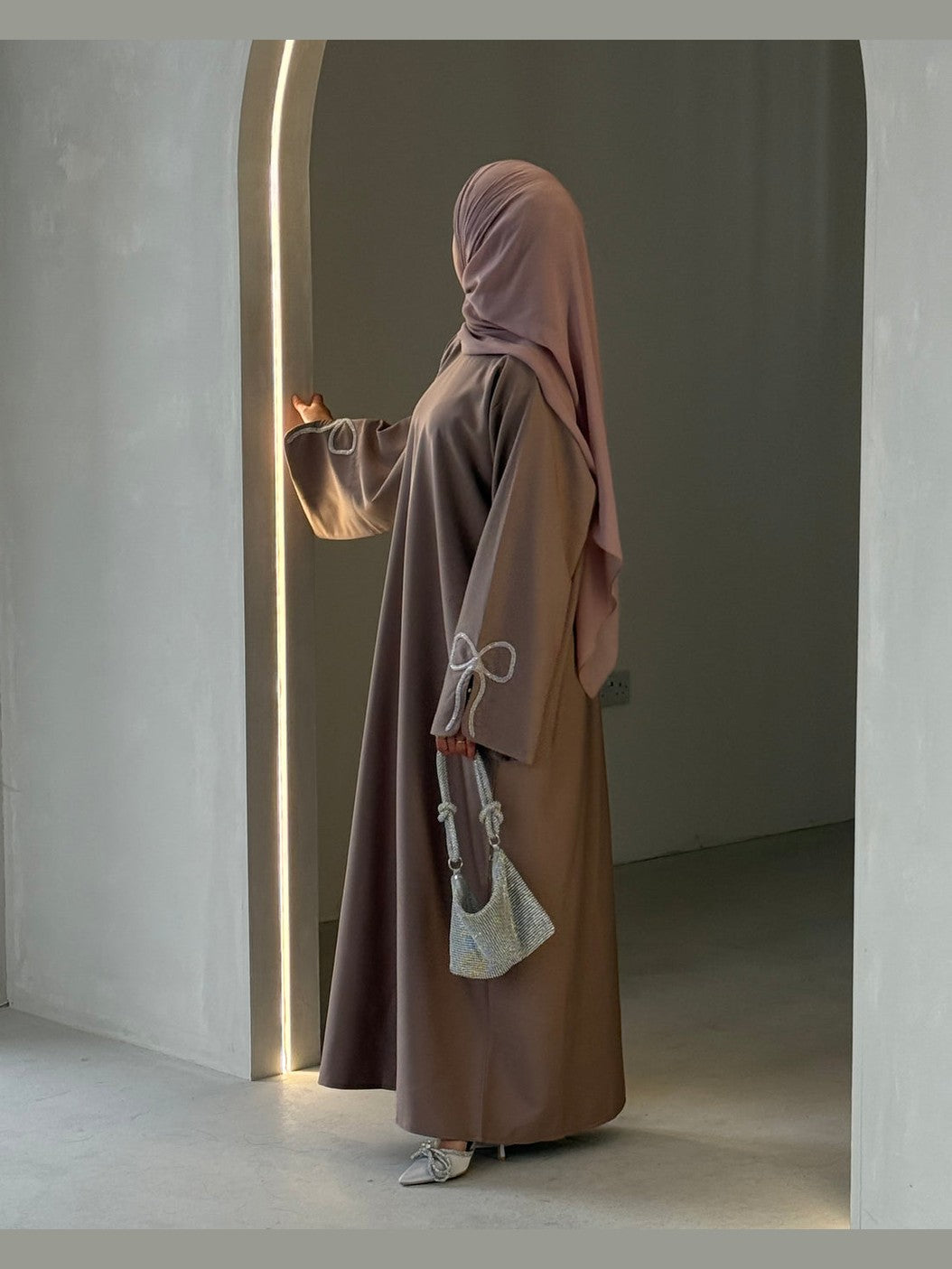 Grace In Cherry-Fawn Closed Abaya With Handcrafted Silver Bow Sleeves