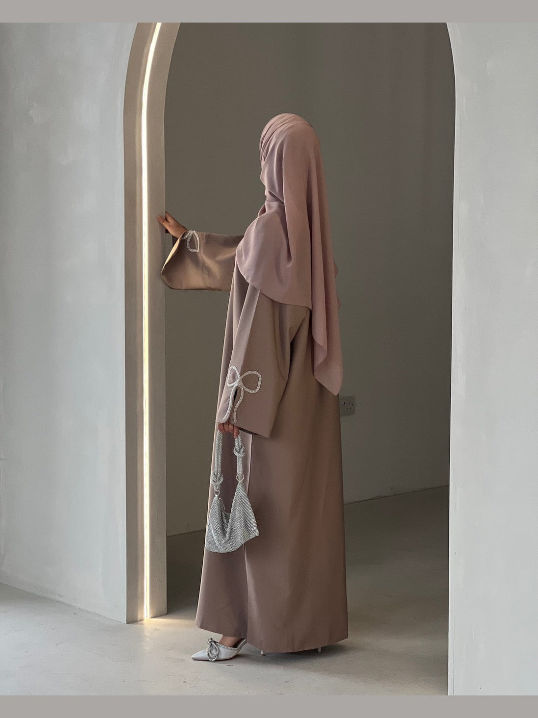 Grace In Cherry-Fawn Closed Abaya With Handcrafted Silver Bow Sleeves